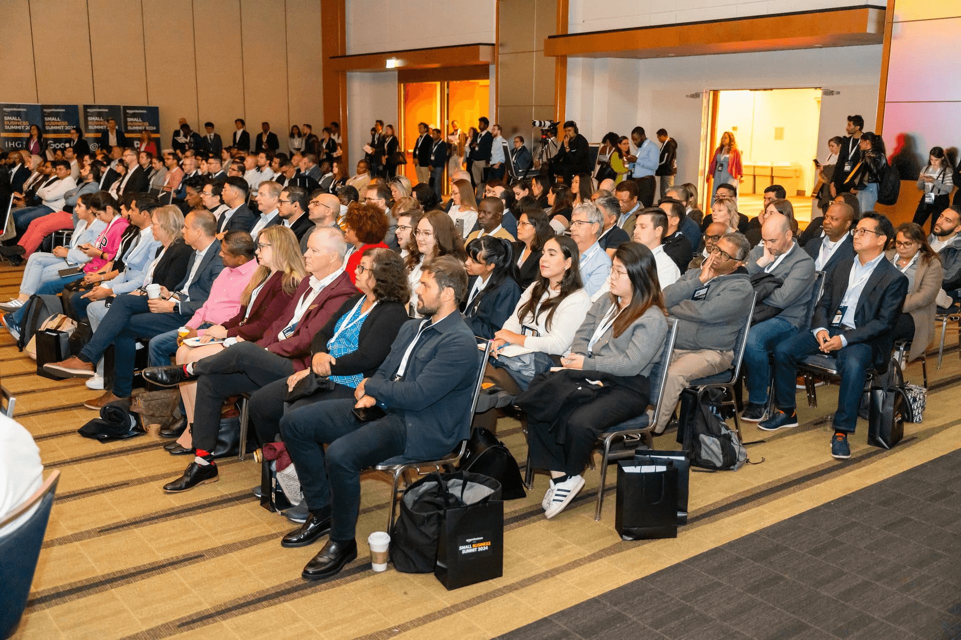 A packed audience seated for a keynote at the Small Business Summit