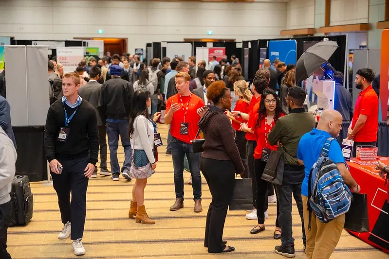 Attendees on the Summit exhibit floor